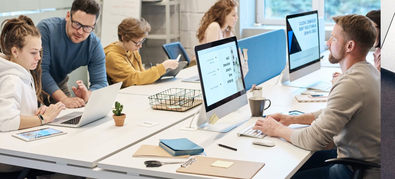 Team collaborating in a shared workspace